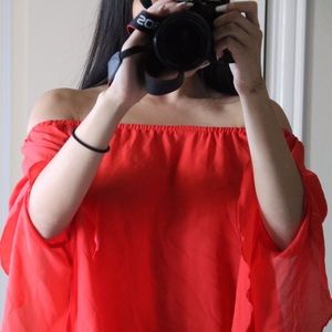 red off-the-shoulder blouse